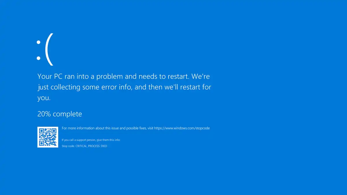 Windows blue screen error with a restart message and QR code