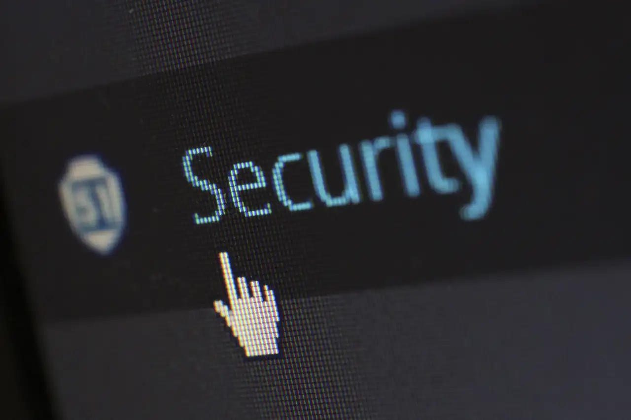 Screen showing the word Security with a hand-shaped cursor